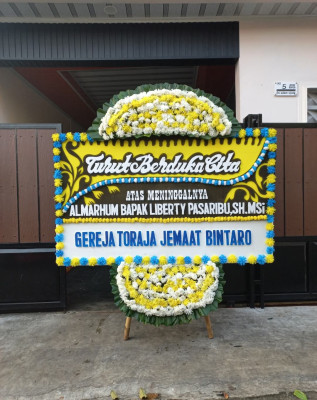 Papan Bunga Duka di Sriharjo